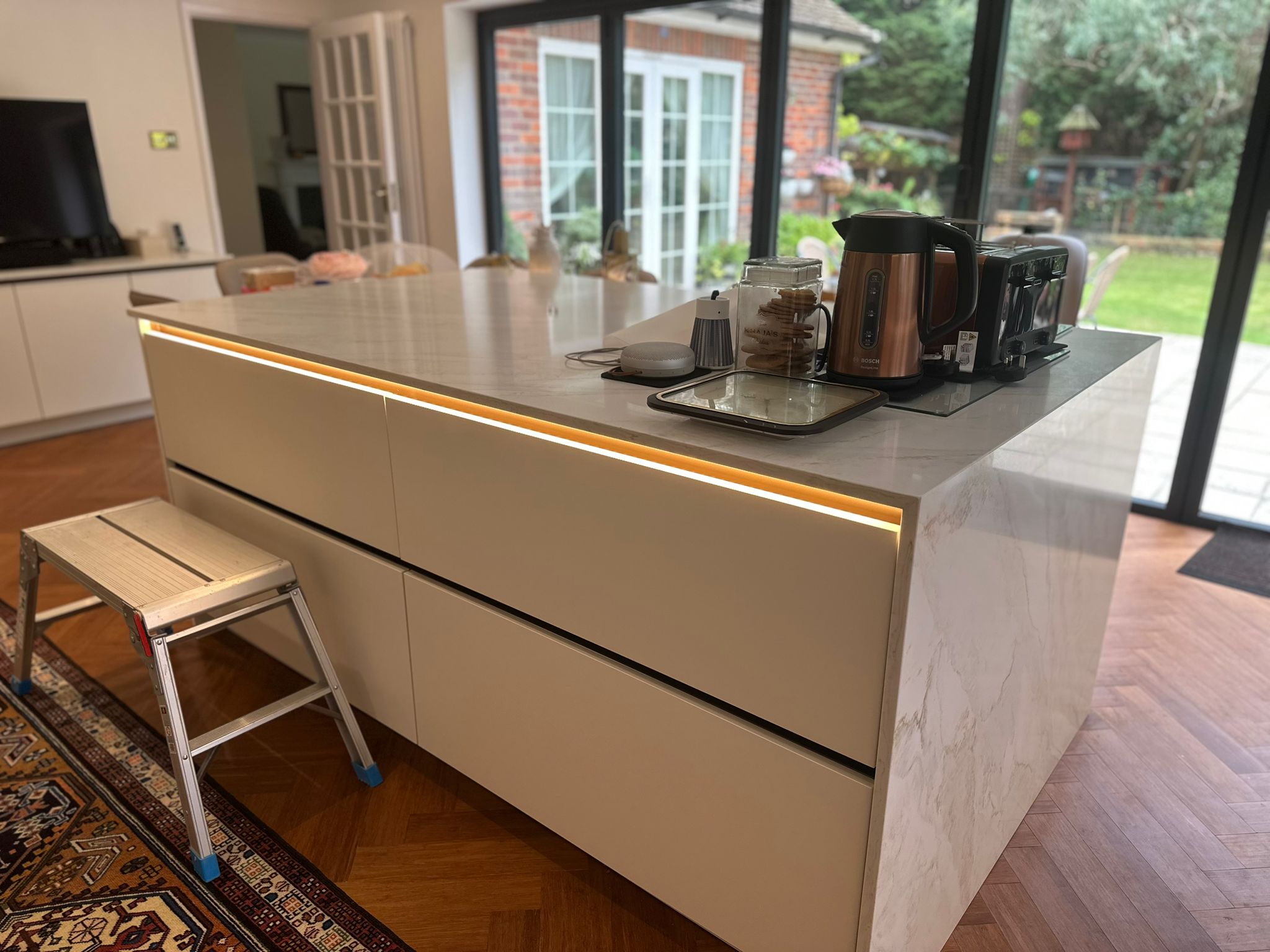 Kitchen island LED strip bifold doors